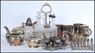 A collection of vintage silver plated wares to include various silver plate flatware and cutlery,
