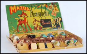 A set of vintage mid 20th century Mazda 'Bambi' Disney lights on a corded wire with multi coloured