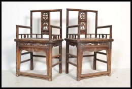 A pair of Chinese walnut elbow Chairs ( armchairs ) with pierced and carved splats with bat