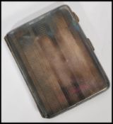 A Sterling Silver machine turned cheroot / cigarette case, the hinged case with geometric machine