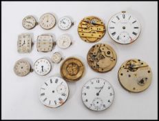 A group of vintage early 20th century pocket watch faces and movements to include J G Graves,