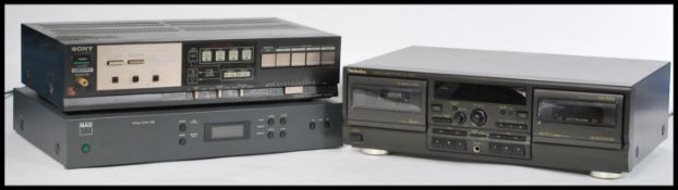 A collection of retro 20th Century stereo equipment to include NAD Stereo Tuner 412,  a Sony amp and