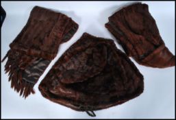 A group of vintage 20th century fur stoles and capes to include one by Russ Winkler. Measures 14cm-