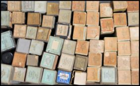 A large collection of vintage pianola rolls in their original boxes, including Beethoven's