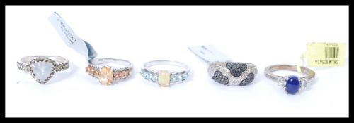 A selection of ladies silver fashion rings to include a stamped 925 silver ring set with a central