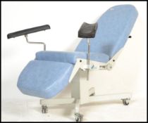 A vintage retro 20th century Industrial Anatomical sample medical gynecology chair by Beaumond