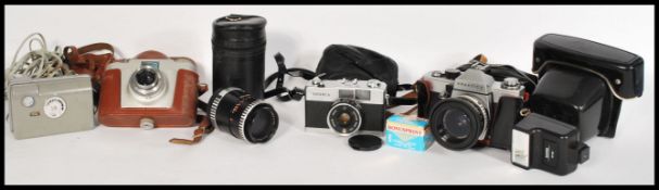 A collection of vintage 20th Century 35mm camera's and lenses to include Practika amongst others,