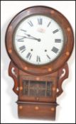 A 19th century Victorian mahogany station wall clock having boxwood inlay with later dial.Roman
