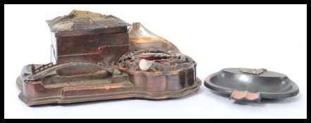 A vintage early 20th century Japanese musical matchbox ashtray match striker along with a similar