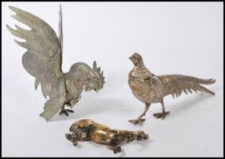 A vintage early 20th century cast brass / bronze figure of a horse along with a silver plated