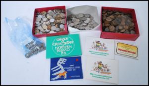 A large collection of coins dating from the 19th century to include Victorian pennies, various early
