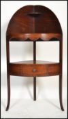 A George III solid mahogany corner washstand - whatnot etargere. Raised on shaped legs with single