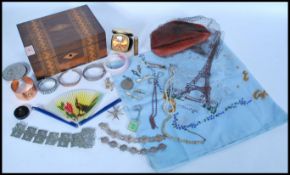 A good collection of vintage jewellery to include a silver hallmarked bangle bracelet, 1950s hat,