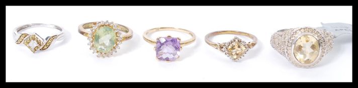 A selection of ladies fashion rings to include a Sheffield hallmarked 9ct gold ring set with a
