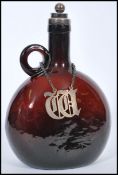 A silver hallmarked collared Dutch amber glass moon flask wine bottle converted to a de-canter, with