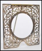 A hallmarked early 20th century silver Goliath watch / picture stand of square form with scrolled