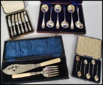 A collection of vintage 20th Century cased silver and silver plate flatware, to include a cased