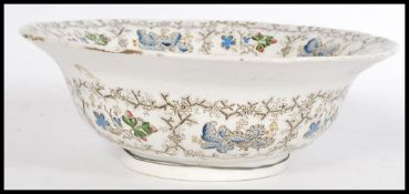 A large 19th century Staffordshire transfer printed footed bowl having transfer printed decoration