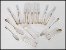 A good collection of silver hallmarked flatware to include a group of three silver hallmarked