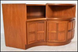 A retro 20th Century teak wood modular two piece corner sideboard / credenza by Nathan, cross banded