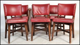 A set of six vintage 20th Century dining chairs ( two carvers ) in the manner of Ben Chairs, the