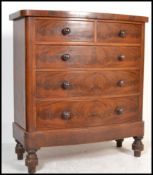 A Victorian flamed mahogany bowfront chest of drawers, with two short and three long graduated
