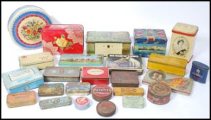 A selection of mid 20th century vintage retro tins / storage containers of advertising interest to