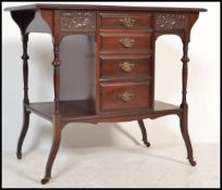 An Edwardian mahogany Art Nouveau writing table / desk. Raised on angled feet with tapering and