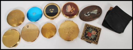 A selection of vintage 20th century compacts to include a selection of Stratton examples, some