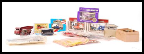 ASSORTED SCALE DIECAST MODEL VEHICLES AND CONSTRUCTION KITS