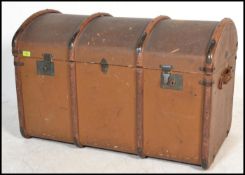 A vintage early 20th Century dome top canvas and c