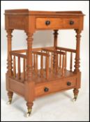A 20th Century chestnut Canterbury / magazine rack / side table, fitted solid top with gallery