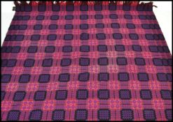 A vintage 20th Century Welsh woollen fringed / tasselled blanket of geometric design with bold