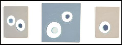 A triptych of contemporary wall art consisting of three acrylic paintings of abstract design with
