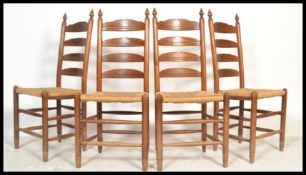 A set of 4 American style oak rattan weave ladderback dining chairs. Raised on turned legs with