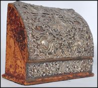 An early 20th century Edwardian wooden desk / stationery tidy by William Davenport, bound in red