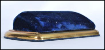 A vintage early 20th century Watch case /  box with blue velvet lining in a gold-tone metal