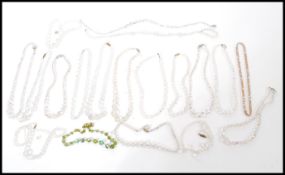 A selection of vintage costume jewellery crystal bead necklaces of varying length and sizes,