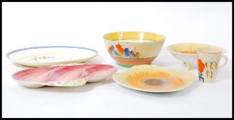 A selection of vintage 20th century retro ceramics to include a Bizarre by Clarice Cliff crocus
