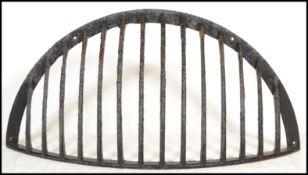 A large 19th century Victorian cast iron painted agricultural / industrial hay feeder of railed