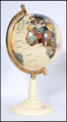 A vintage retro 20th century lapis lazuli type semi precious stone inlay desk top globe raised on