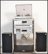 A vintage retro 20th century Akai Hi-Fi music entertainment stacking system consisting of a Direct
