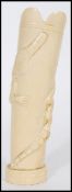 An early 20th century Ivory vase having relief decoration of alligators / crocodiles with