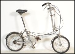 A vintage / retro 20th Century Bickerton portable folding bicycle, with three speed Sturmey Archer