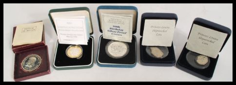 A selection of proof coins in presentation boxes t