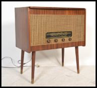 A mid century teak wood Marconiphone 2596 serial number radiogram - stereogram having decorative