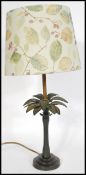 A 20th century bronze table lamp in the form of a