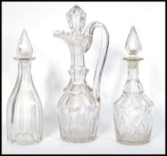 An early 19th Century English heavy cut glass Claret Jug / decanter with fitted stopper, riveted