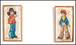 A pair of retro 1950's Mont Martre oil paintings of French origin depicting boy and girl, signed
