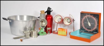 A collection of retro items to include wall hanging kitchen scales, a preserve / jam pot, soda
